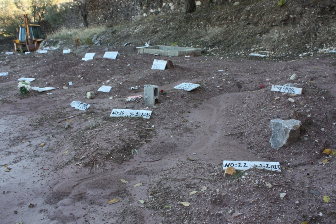 Refugee graves occupy the furthest corner of the graveyard